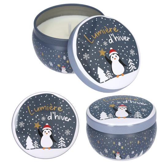 Bougie de Noël dans une boîte métallique ronde