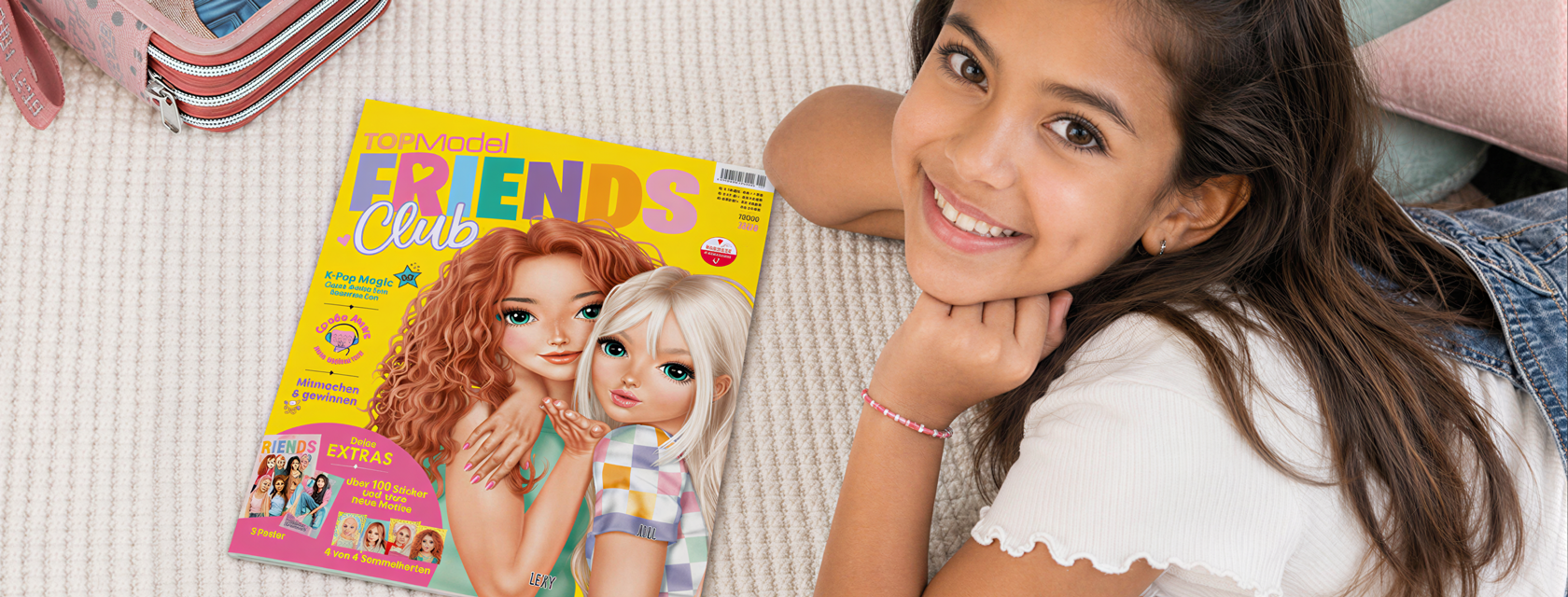TOPModel Friendsclub Magazin mit lächelndem Mädchen